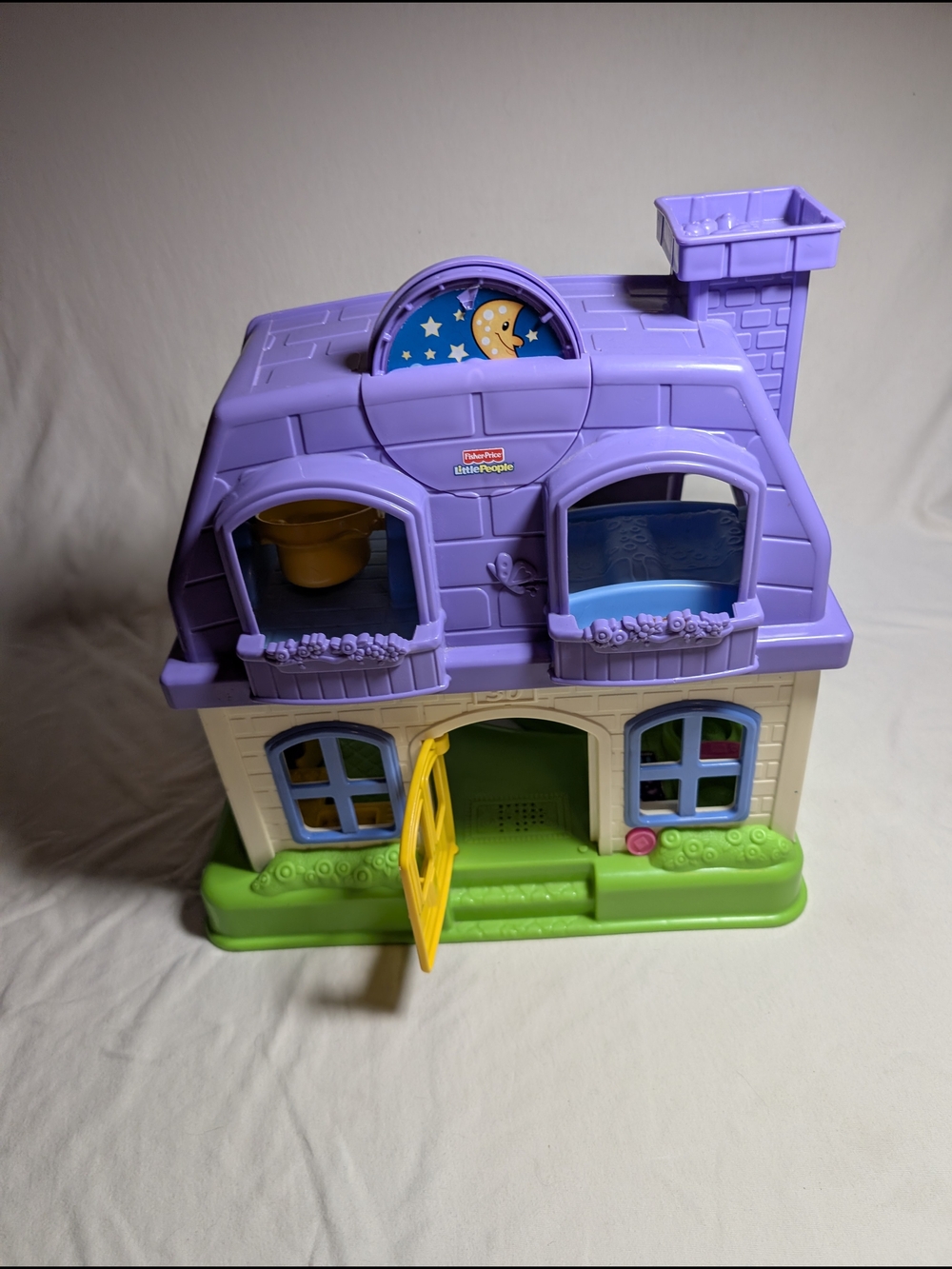 Fisher-Price Little People Purple Roof Playhouse with Green Base and Yellow Door